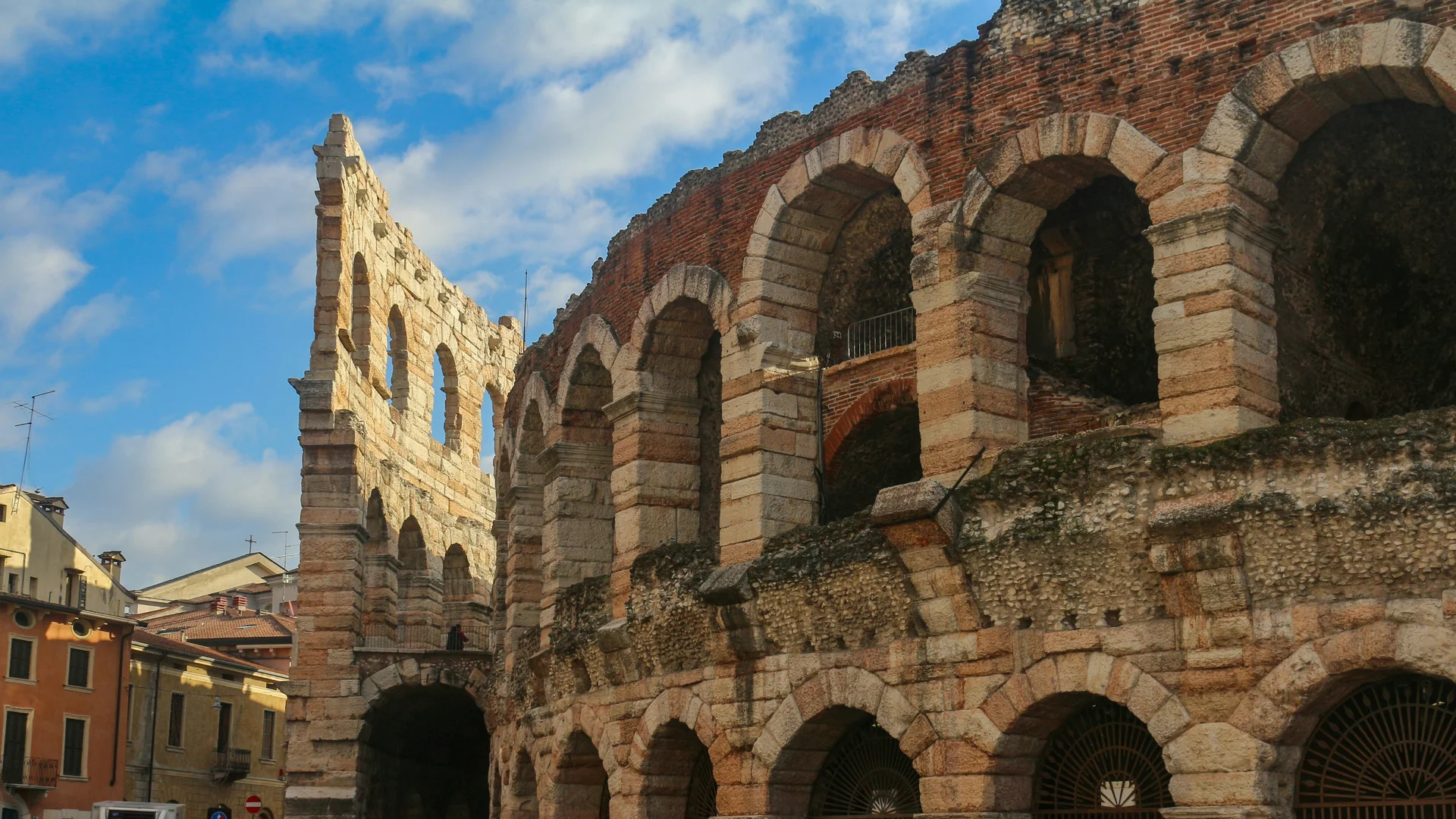 Hotel Touring in Verona | Picture gallery Exterior view of the Roman amphitheater in Verona under blue sky